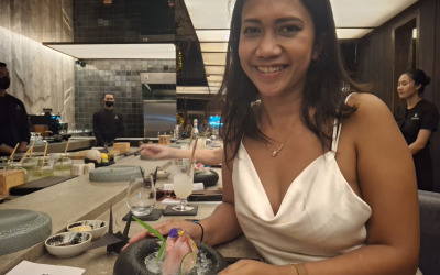Olivia showing the 3 different types of sashimi. We especially liked the blue fin tuna belly.