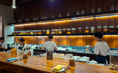 The bar area features a large number of jars demonstrating the chefs passion for fermentation.